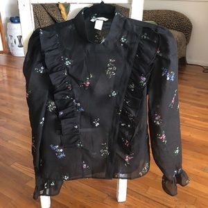 Ruffle top black with floral design
